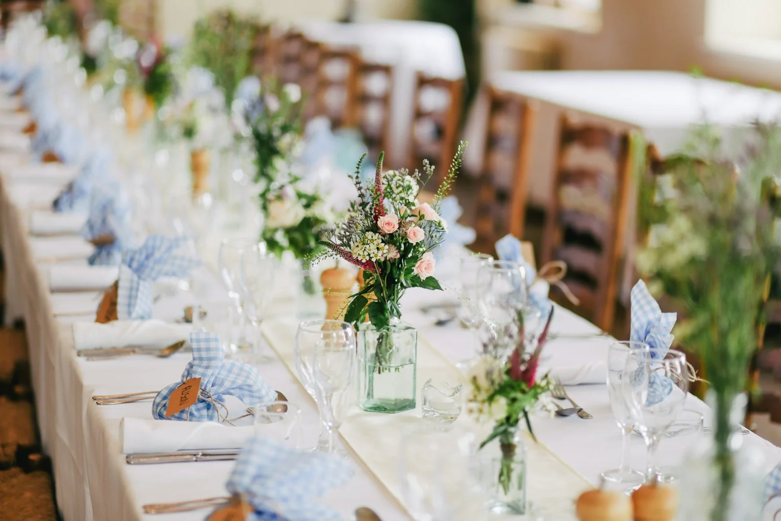 Floral reception setting with decorated tables